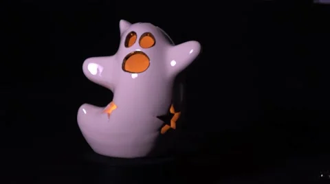 Halloween ceramic ghost slowly rotating with lightning effect Stock Footage 67961346
