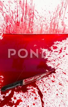 Halloween concept : bloody knife with blood splatter Stock Photos