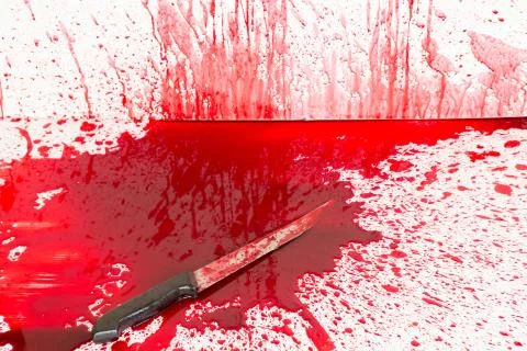 Halloween concept : bloody knife with blood splatter Stock Photos