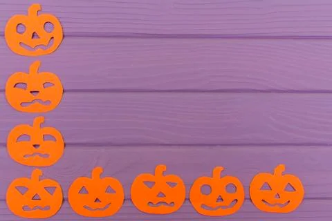 Halloween corner frame with different pumpkin paper silhouettes Stock Photos