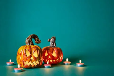 Halloween creative background with diy ceramic pumpkins jack lantern and cand Foto stock