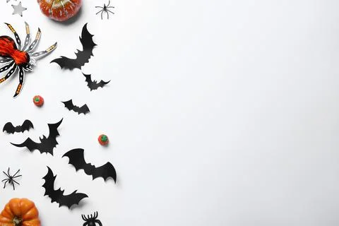 Halloween decor elements on white background, flat lay. Space for text Stock Photos