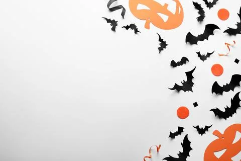 Halloween decor elements on white background, flat lay. Space for text Stock Photos