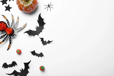 Halloween decor elements on white background, flat lay. Space for text Stock Photos