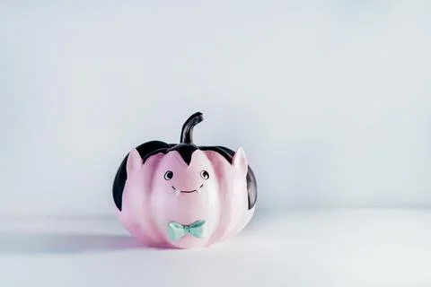 Halloween decorations on dark pink background. Funny and cute pink Vampire Stock Photos