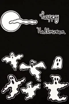 Halloween decorations ghosts, moon, cloud and letters Stock Photos