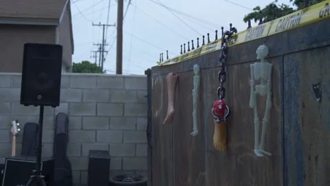 Halloween Decorations on a Rusty Gate Stock Footage 219963760