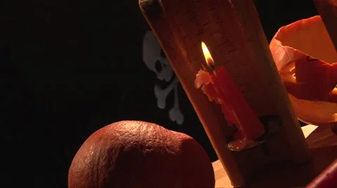 Halloween dinner table, smoke of extinguished candle Stock Footage 68019603