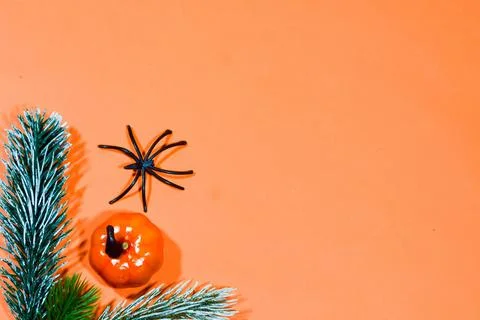 Halloween double border of scattered candy and decor. Flat lay over an oran.. Stock Photos