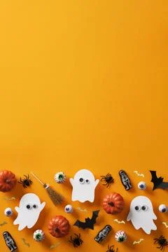 Halloween flat layer with paper ghosts, pumpkins, eyeballs and spooky decorat Stock Photos