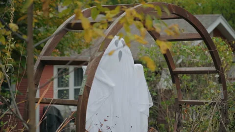 Halloween Ghost Decoration Floating on a Fall Day Stock Footage 163867989
