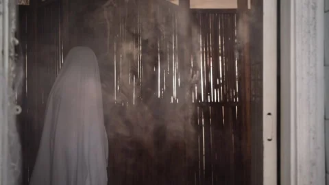 Halloween ghost in white sheet. Horror halloween spooky concept. Stock Footage 312202780
