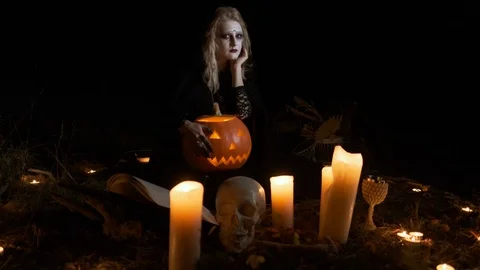 Halloween. The Image Of Young Witch. Video stock 117928524