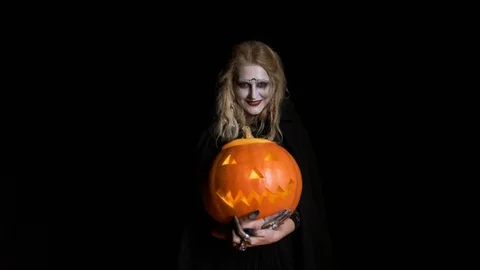 Halloween. The Image Of Young Witch. Stock Footage 117930014