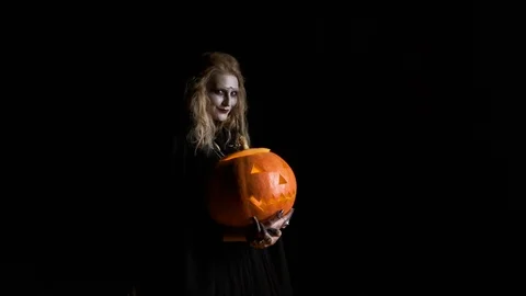 Halloween. The Image Of Young Witch. Stock Footage 117930519