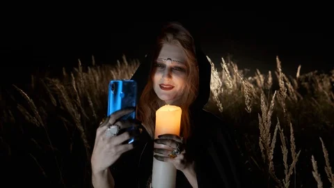 Halloween. The Image Of Young Witch. Video stock 117935719