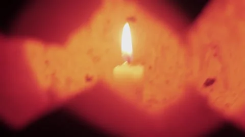 Halloween Jack o lantern with burning candle floats in dark space close up Video stock 68175490