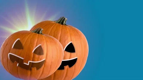 Halloween jack o lantern pumpkin animated on blue background Stock Footage 141264339