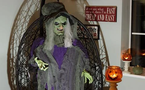 Halloween - masquerade custom, witch. Stock Photos