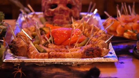 Halloween Meat Skull Buffet Platter with Bacon and Party Food Stock Footage 336815848