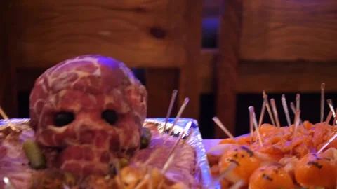 Halloween Meat Skull Buffet Platter with Bacon and Party Food Video stock 336815877