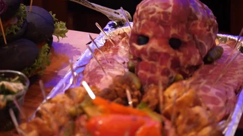 Halloween Meat Skull Buffet Platter with Bacon and Party Food Video stock 336816023