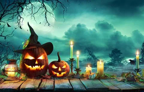 Halloween At Night - Pumpkins With Witch Hat And Candles Stock Photos