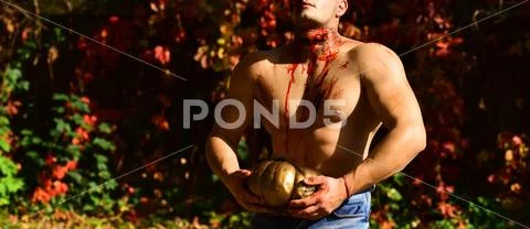 Halloween or horror concept - screaming walking dead zombie. Death - young man Stock Photos
