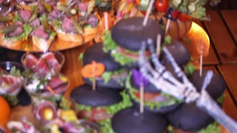 Halloween Party Catering Buffet Table with Mini Black Burgers Video stock 336808842