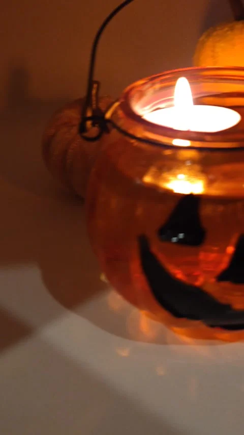 Halloween pumpkin and candle macro photography Stock Footage 319689628