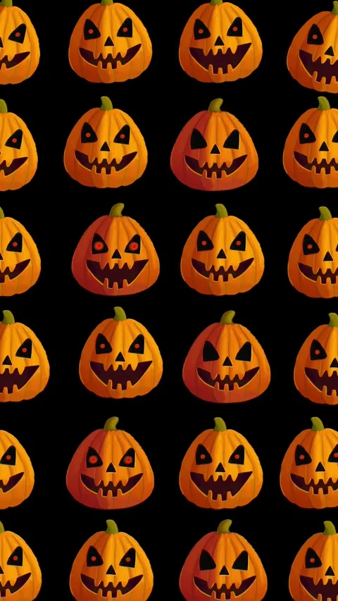 Halloween pumpkin animated vertical background with scary faces on black 库存影片 344315052