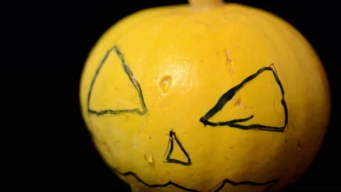 Halloween, a pumpkin is crying on a dark background. Stock Footage 166704594