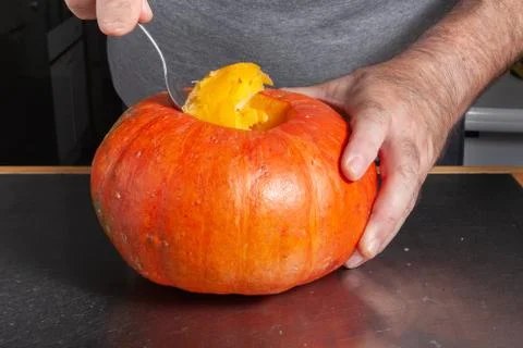 Halloween pumpkin cutting process, process of making Jack-o-lantern. 写真素材