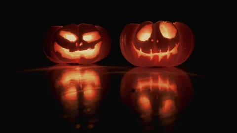 Halloween Pumpkin on the the Dark Background. Evil Pumpkin perfect for the .. Stock Footage 318779089