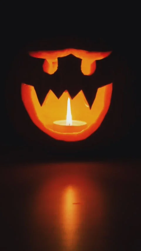 Halloween Pumpkin on the the Dark Background. Evil Pumpkin perfect for the .. 스톡 동영상 318779091