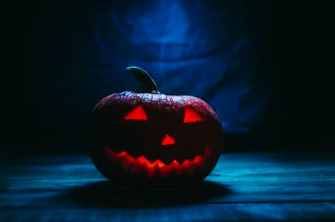Halloween Pumpkin In Dark Stock Photos