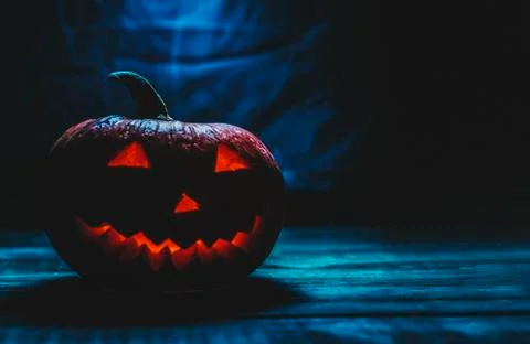 Halloween Pumpkin In Dark Stock Photos