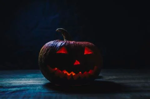 Halloween Pumpkin In Dark Stock Photos