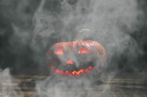 Halloween Pumpkin In Dark Stock Photos