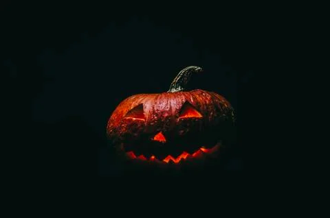 Halloween Pumpkin In Dark Stock Photos