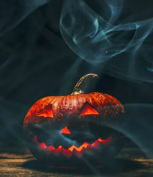 Halloween Pumpkin In Dark Stock Photos