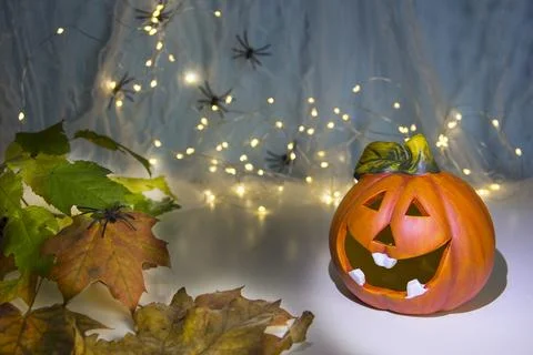 Halloween pumpkin head jack lantern with burning candles over wooden backgr.. Fotos Stock