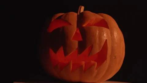 Halloween pumpkin jack-o-lantern candle lit. Dark, vegetable. Stock Footage 140966431