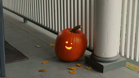 Halloween Pumpkin Jack-O'-Lantern with a Tiny Face 4K Slow Motion Stock Footage 308196894