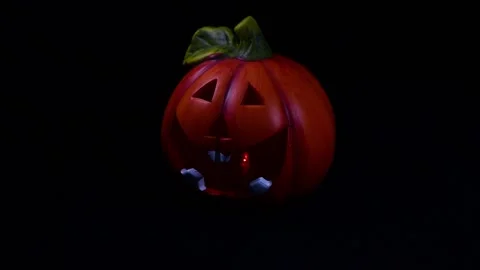 Halloween pumpkin lantern on black background Stock Footage 140687111