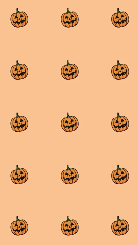 Halloween pumpkin pattern on orange background loop - vertical for social media Stock Footage 253410125