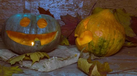 Halloween pumpkin pulls a rug from under its mate 動画素材 68677092
