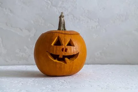 Halloween pumpkin on white table Stock Photos