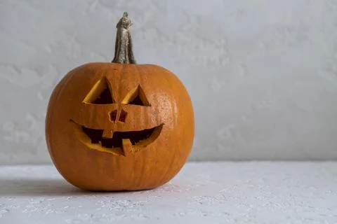 Halloween pumpkin on white table Stock Photos