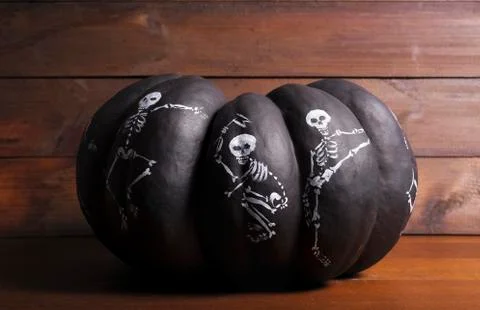 Halloween pumpkin on wooden background Photos
